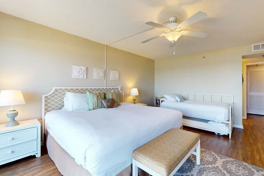 Beachfront condo with Gulf views, pool, tennis, gym, & private balcony