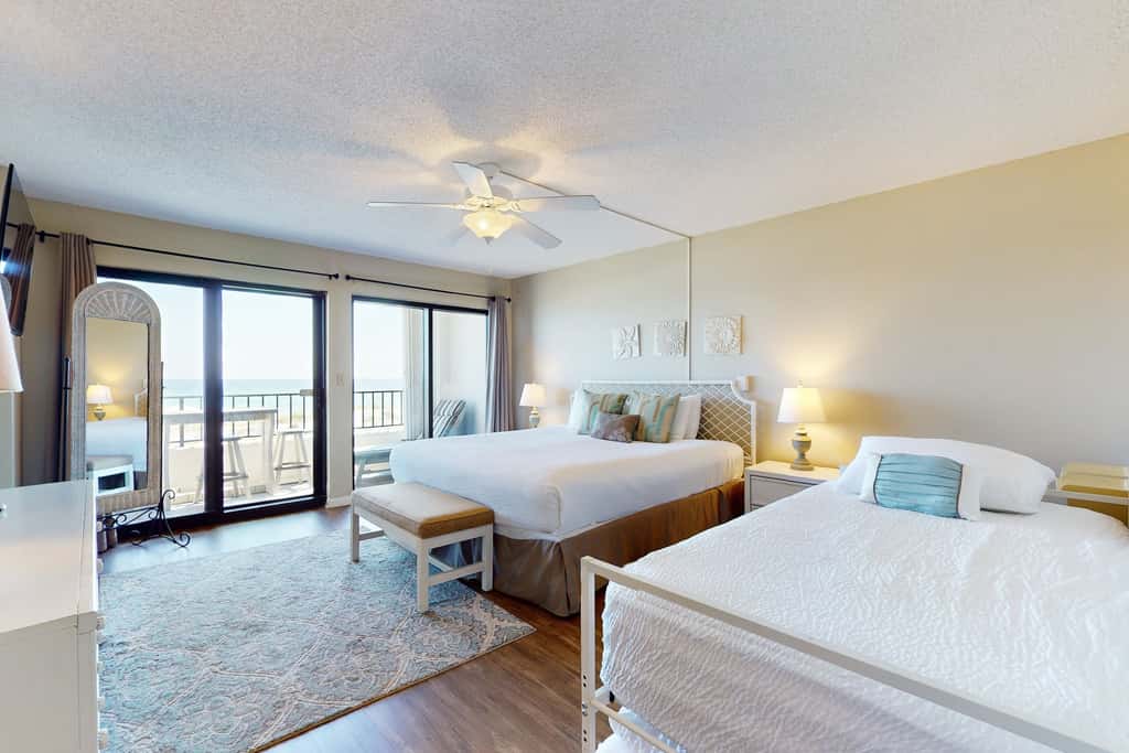 Beachfront condo with Gulf views, pool, tennis, gym, & private balcony