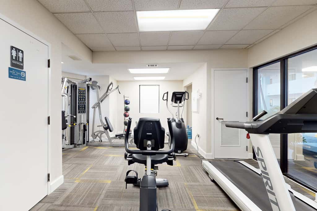 Beachfront condo with Gulf views, pool, tennis, gym, & private balcony