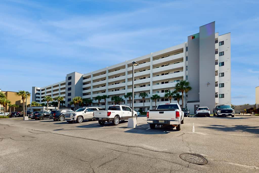 Beachfront condo with Gulf views, pool, tennis, gym, & private balcony