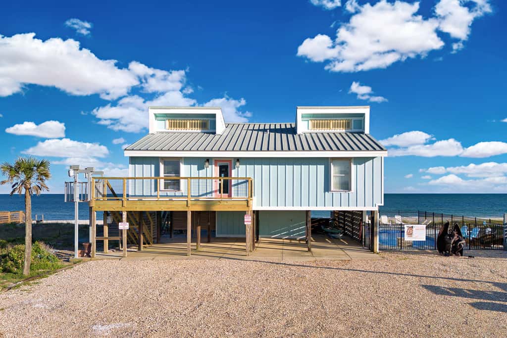 Dog-friendly with Gulf view, pool, balcony, deck, fireplace, central AC, & W&D