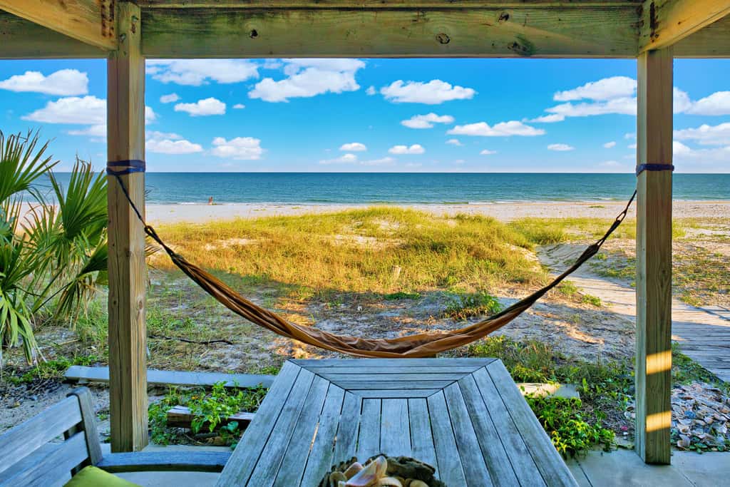 Dog-friendly with Gulf view, pool, balcony, deck, fireplace, central AC, & W&D