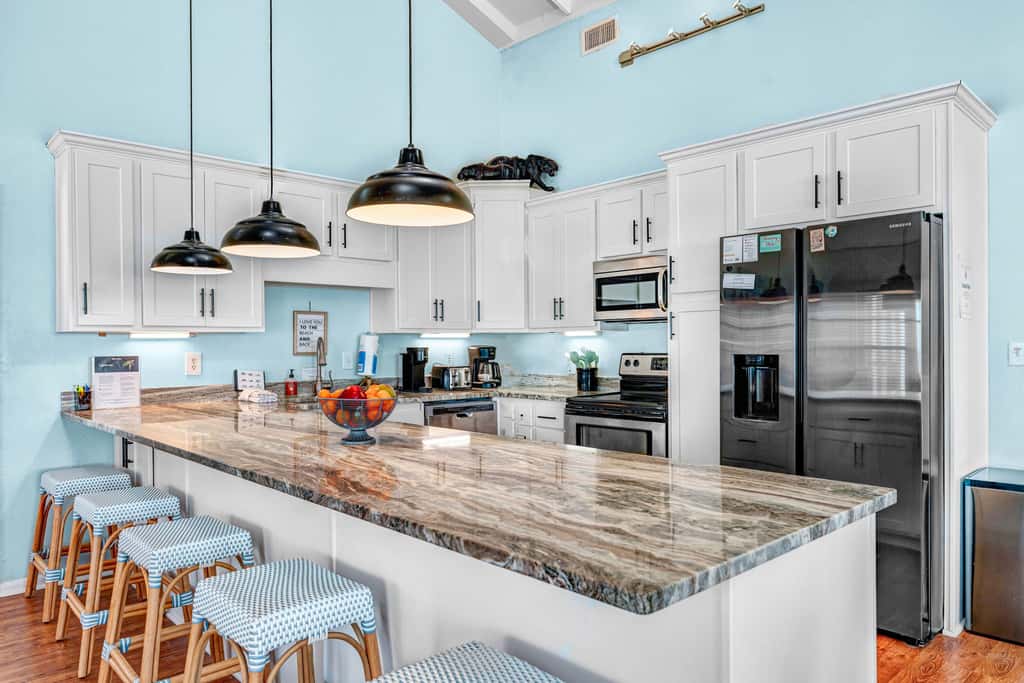 Dog-friendly with Gulf view, pool, balcony, deck, fireplace, central AC, & W&D