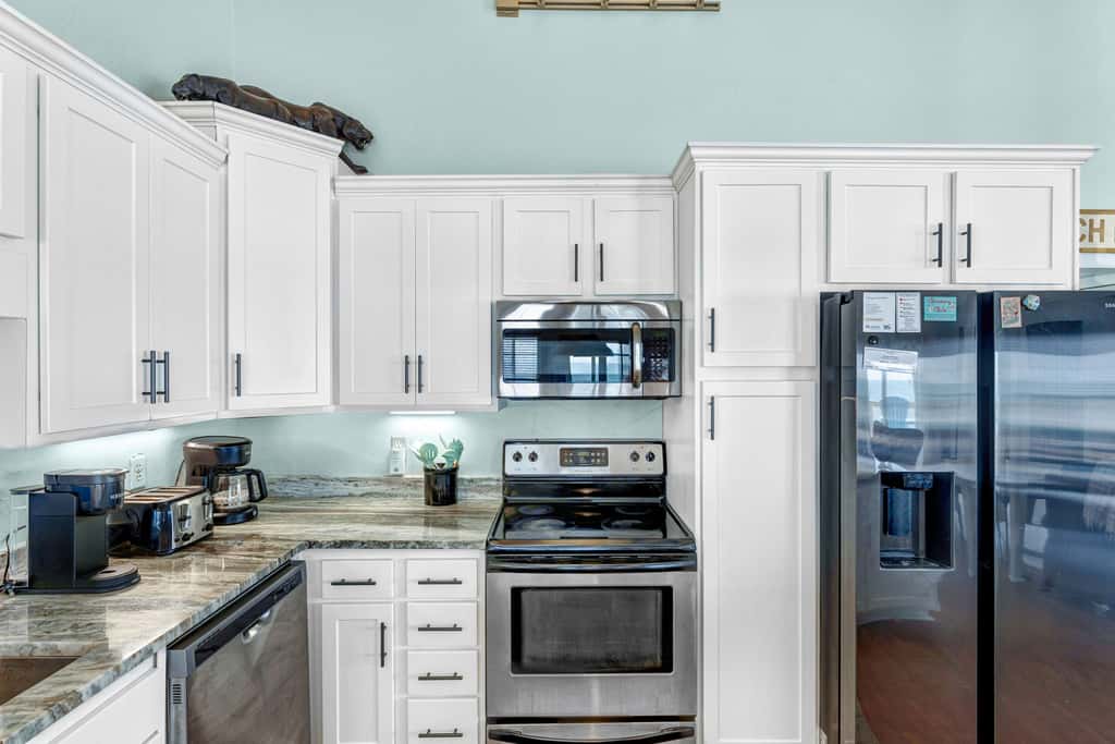 Dog-friendly with Gulf view, pool, balcony, deck, fireplace, central AC, & W&D
