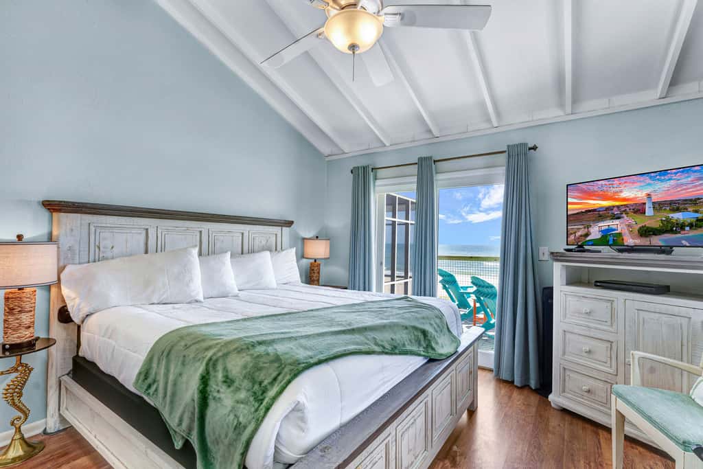 Dog-friendly with Gulf view, pool, balcony, deck, fireplace, central AC, & W&D