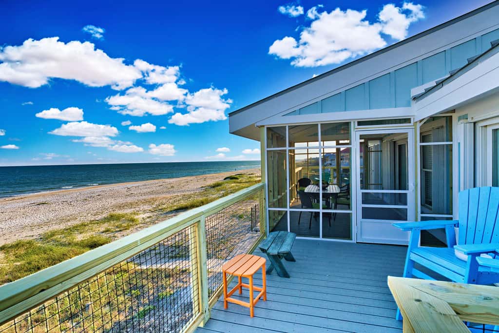Dog-friendly with Gulf view, pool, balcony, deck, fireplace, central AC, & W&D