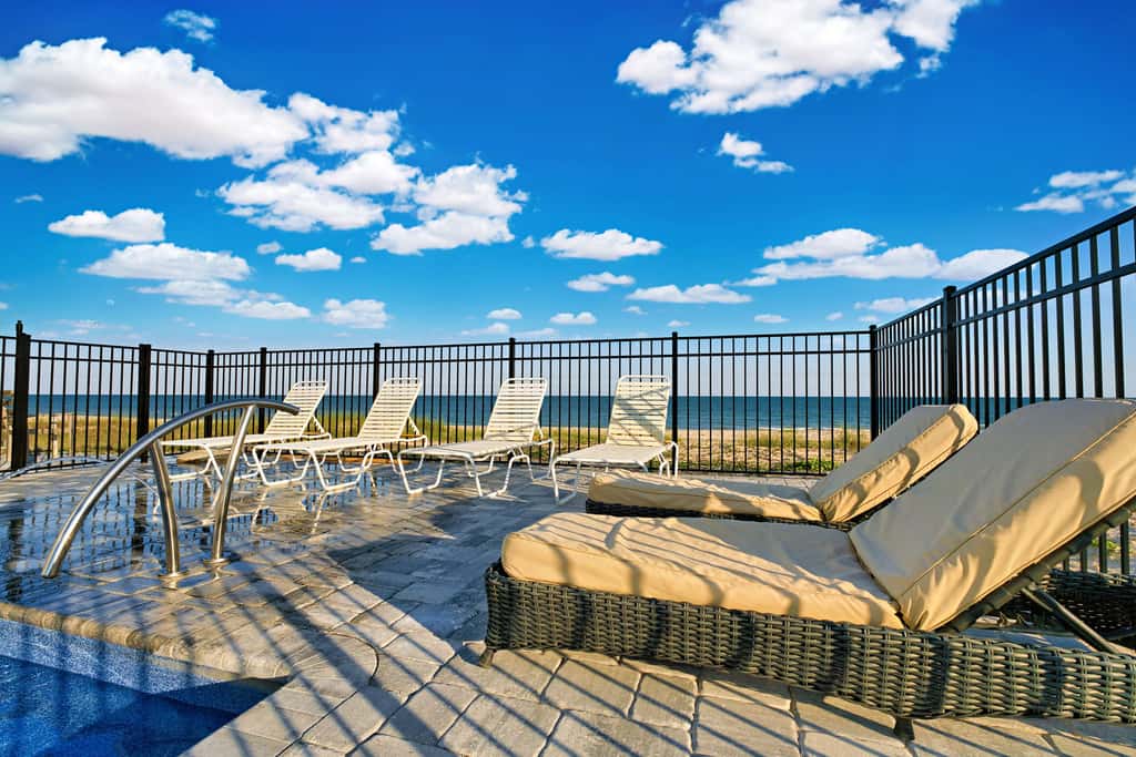 Dog-friendly with Gulf view, pool, balcony, deck, fireplace, central AC, & W&D