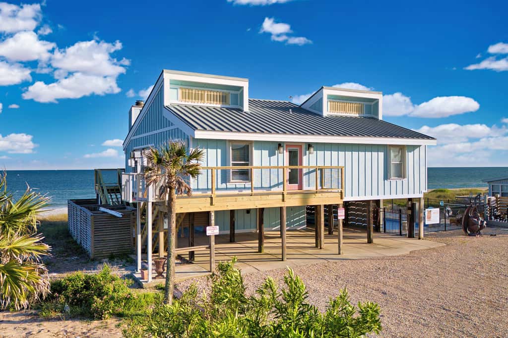 Dog-friendly with Gulf view, pool, balcony, deck, fireplace, central AC, & W&D