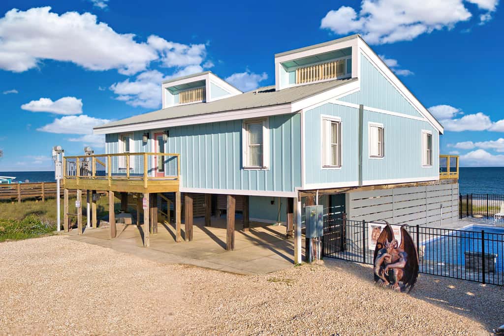 Dog-friendly with Gulf view, pool, balcony, deck, fireplace, central AC, & W&D