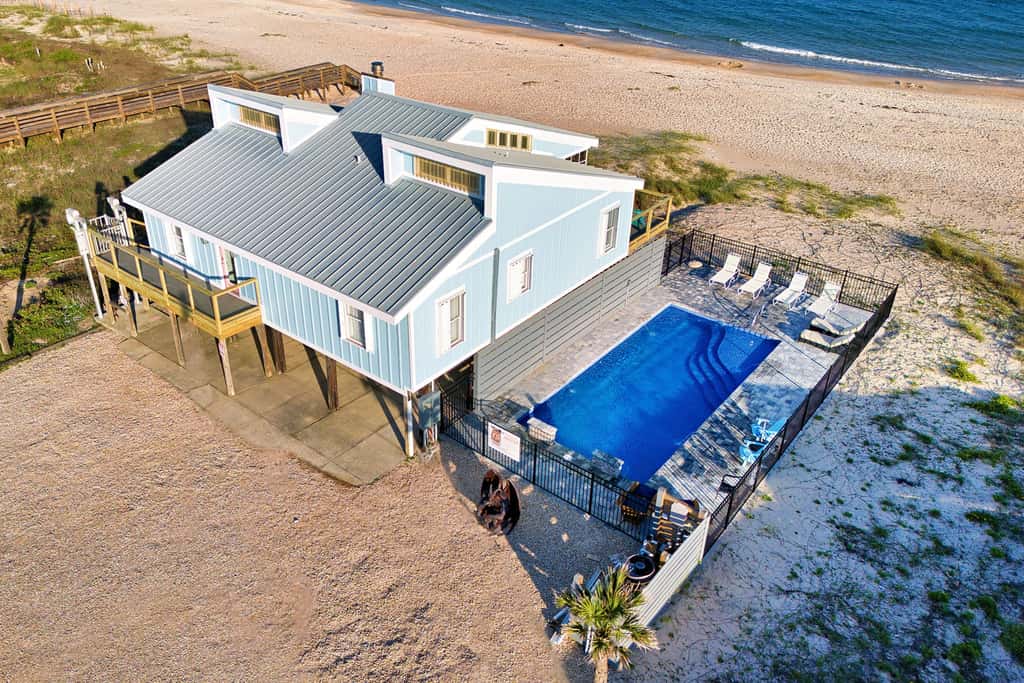 Dog-friendly with Gulf view, pool, balcony, deck, fireplace, central AC, & W&D