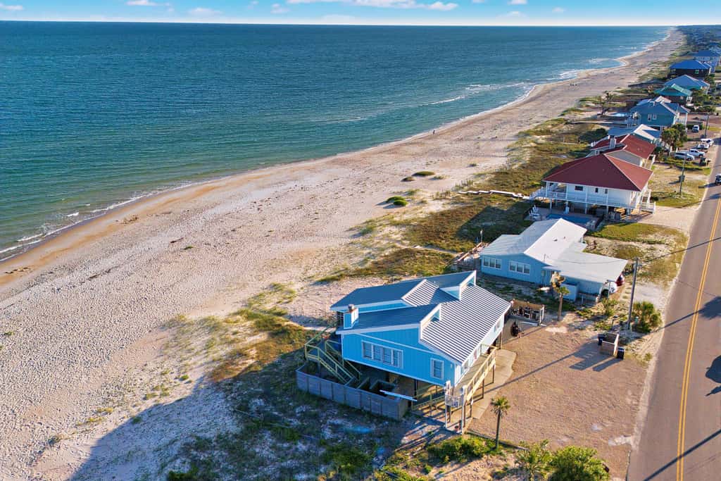 Dog-friendly with Gulf view, pool, balcony, deck, fireplace, central AC, & W&D