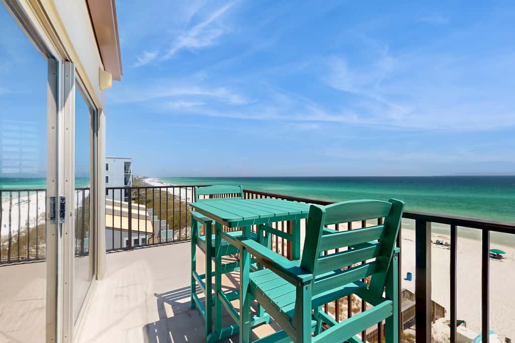 Spacious beachfront condo with full kitchen, shared pool and beach access