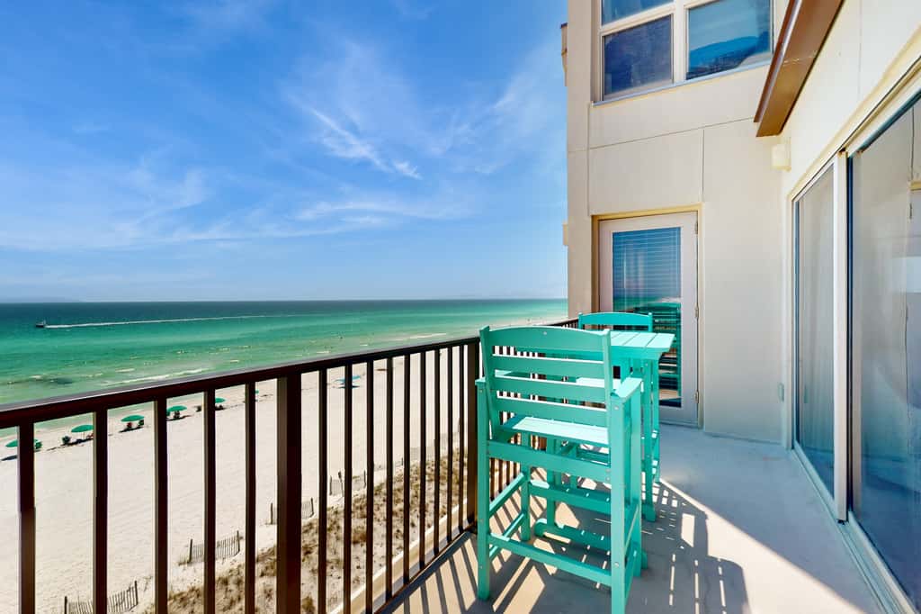 Spacious beachfront condo with full kitchen, shared pool and beach access