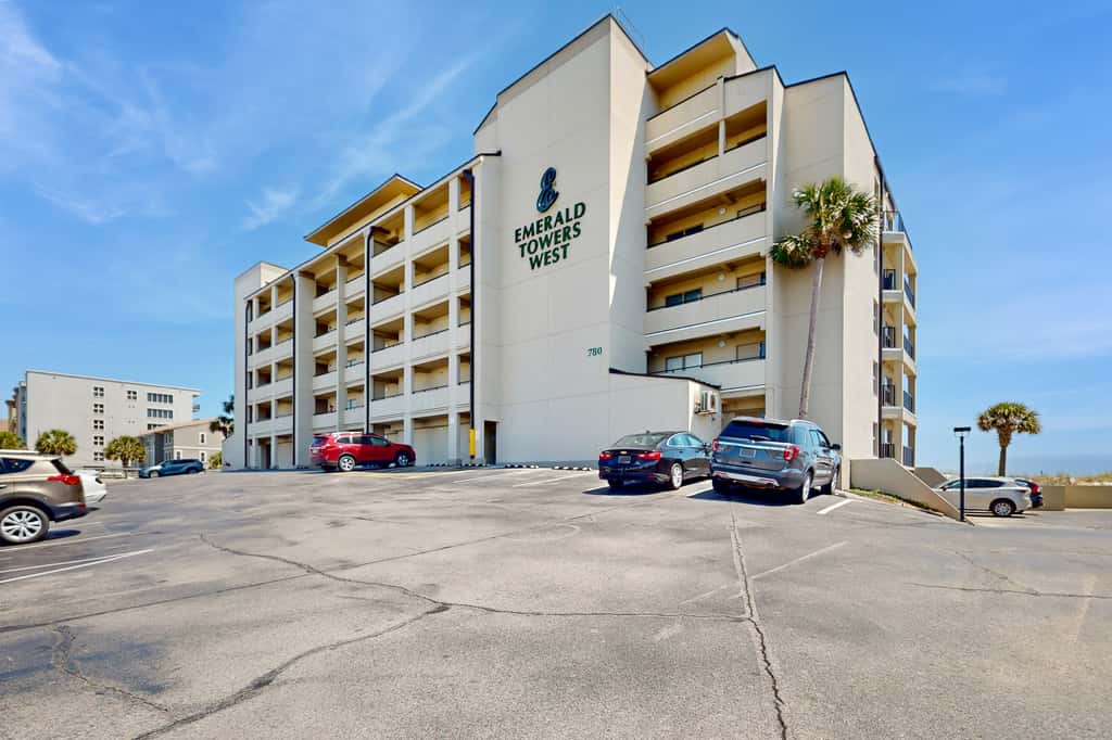 Spacious beachfront condo with full kitchen, shared pool and beach access