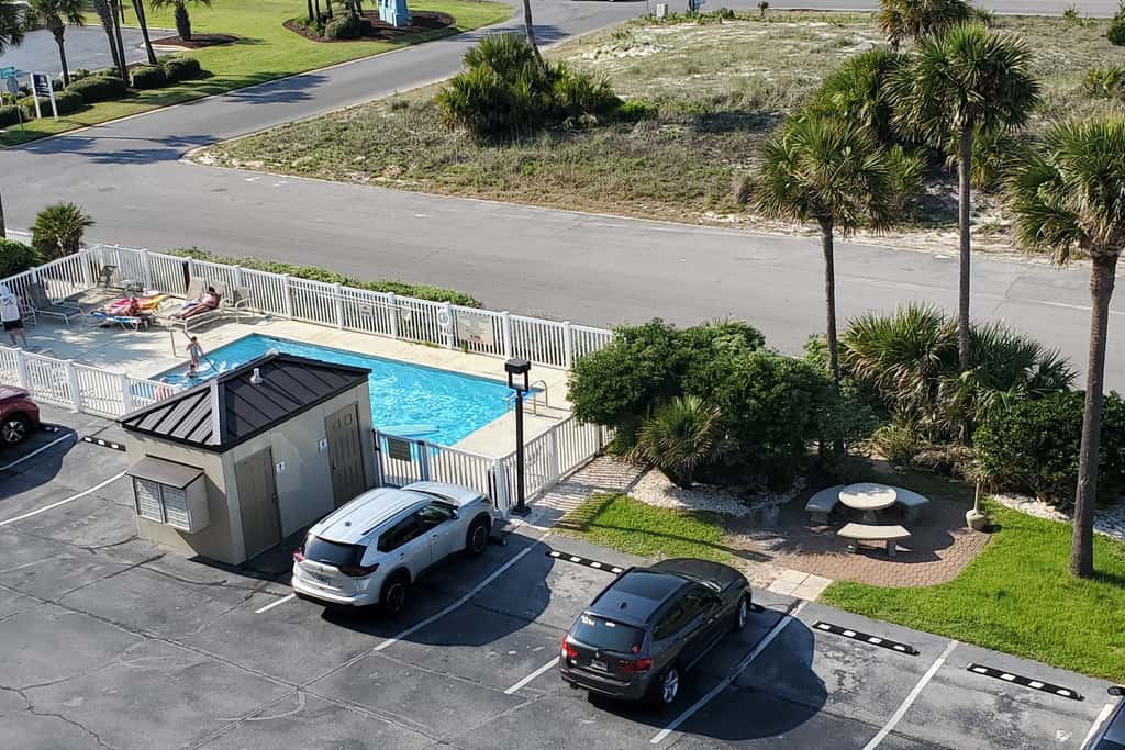 Spacious beachfront condo with full kitchen, shared pool and beach access