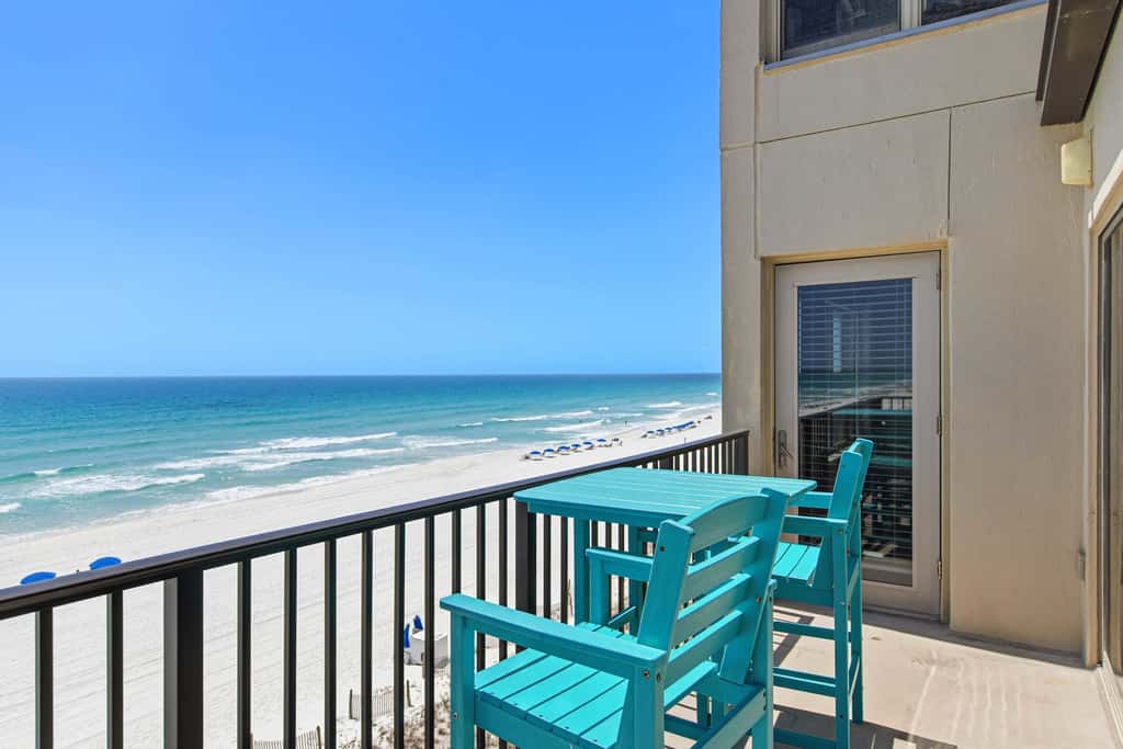 Spacious beachfront condo with full kitchen, shared pool and beach access