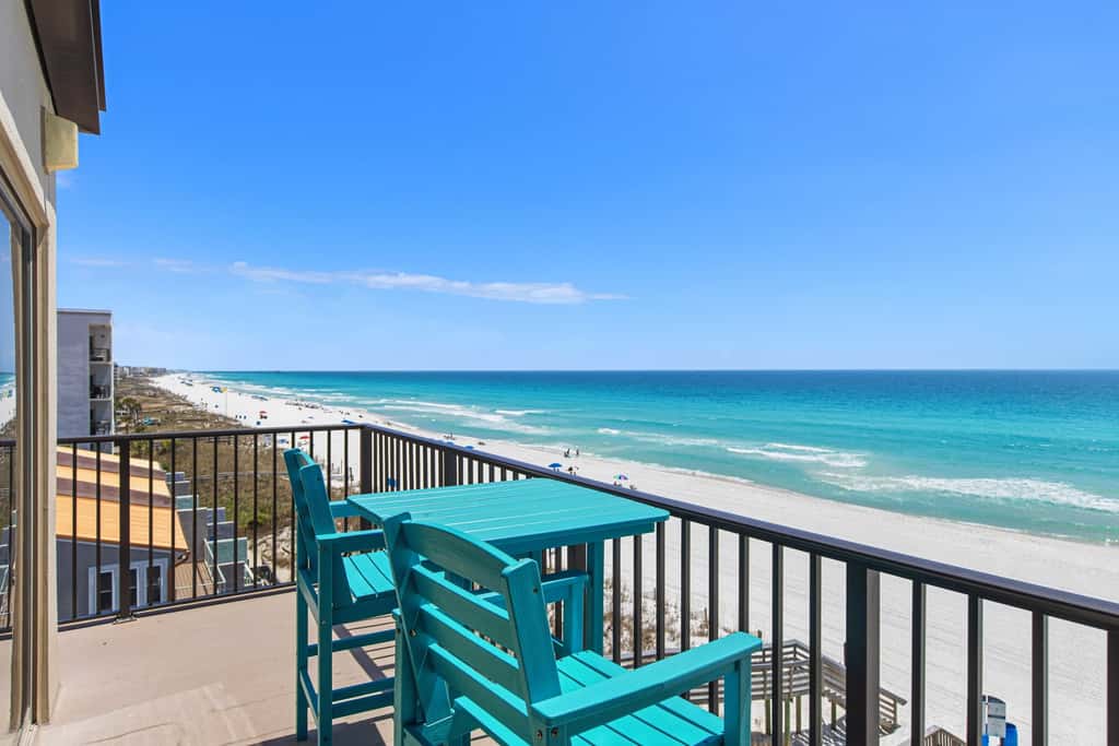 Spacious beachfront condo with full kitchen, shared pool and beach access