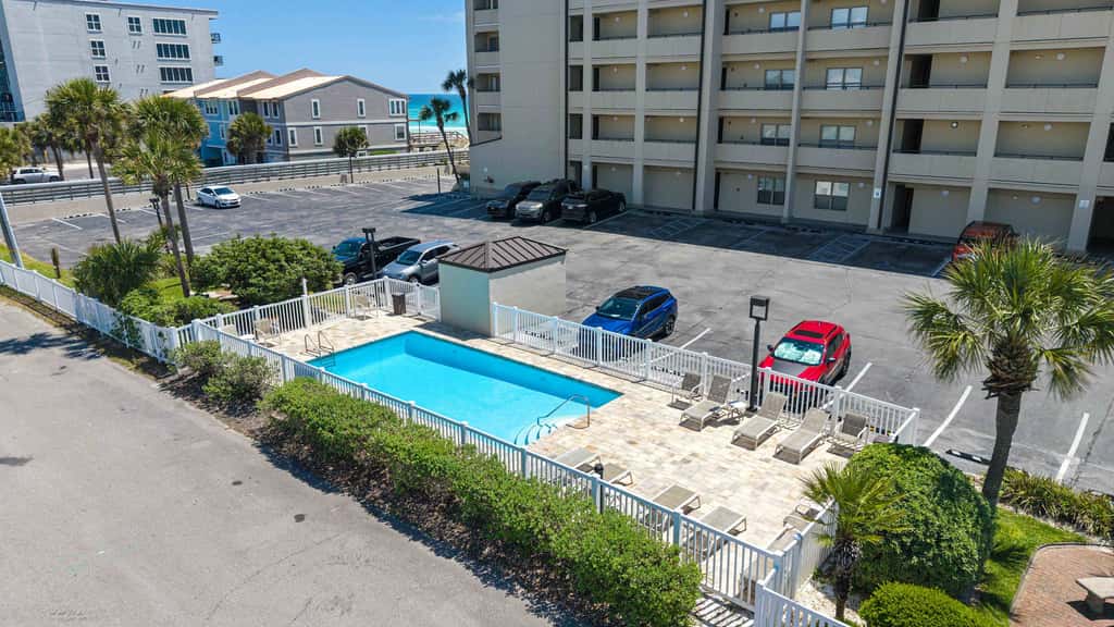 Spacious beachfront condo with full kitchen, shared pool and beach access