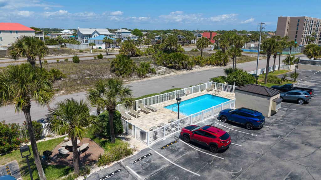 Spacious beachfront condo with full kitchen, shared pool and beach access