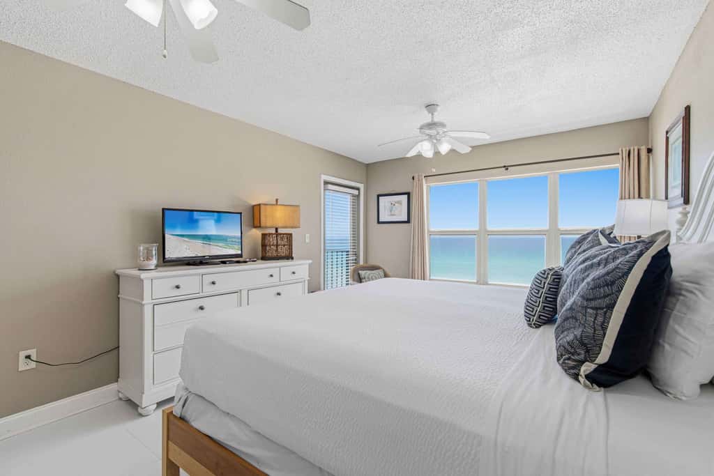 Spacious beachfront condo with full kitchen, shared pool and beach access
