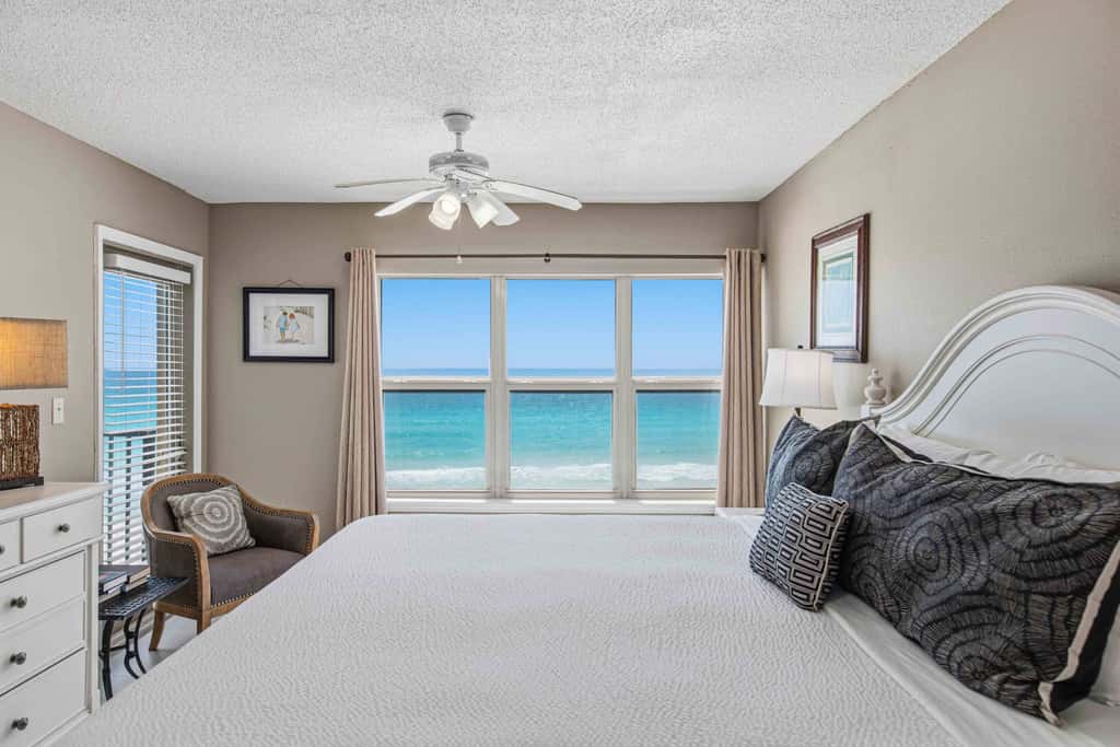 Spacious beachfront condo with full kitchen, shared pool and beach access