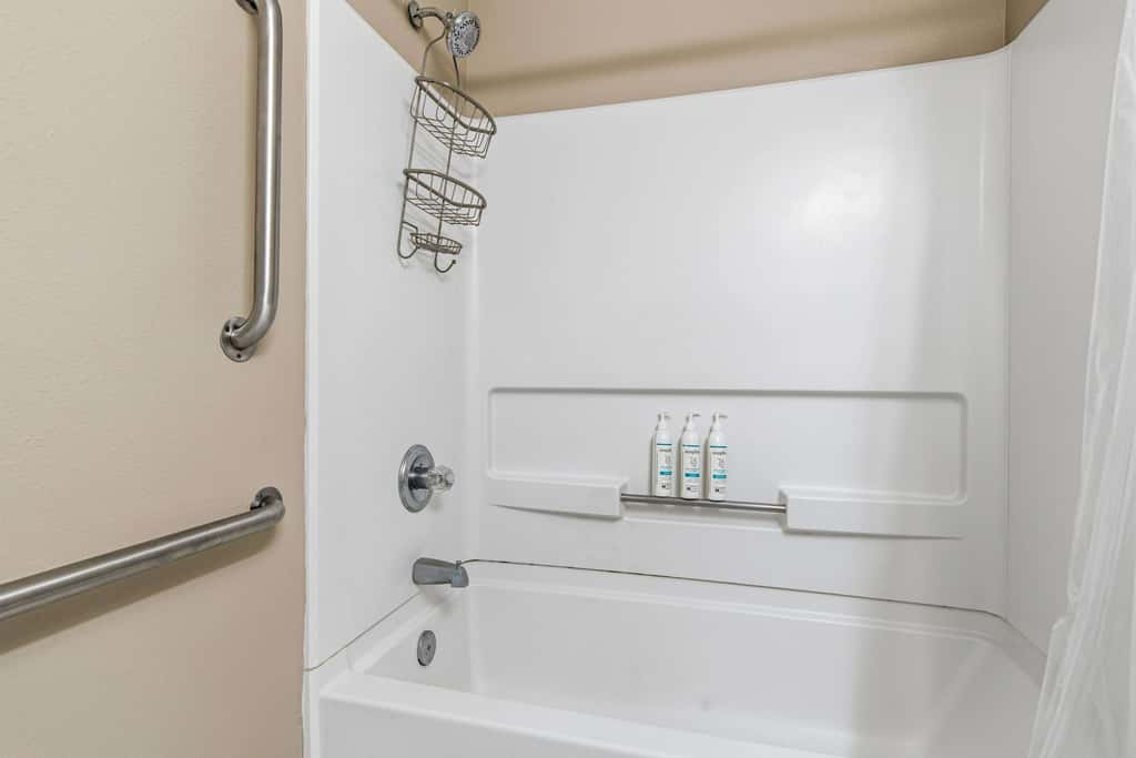 Spacious beachfront condo with full kitchen, shared pool and beach access