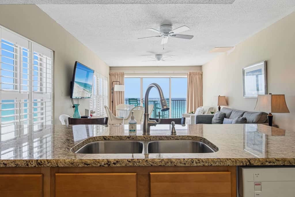 Spacious beachfront condo with full kitchen, shared pool and beach access