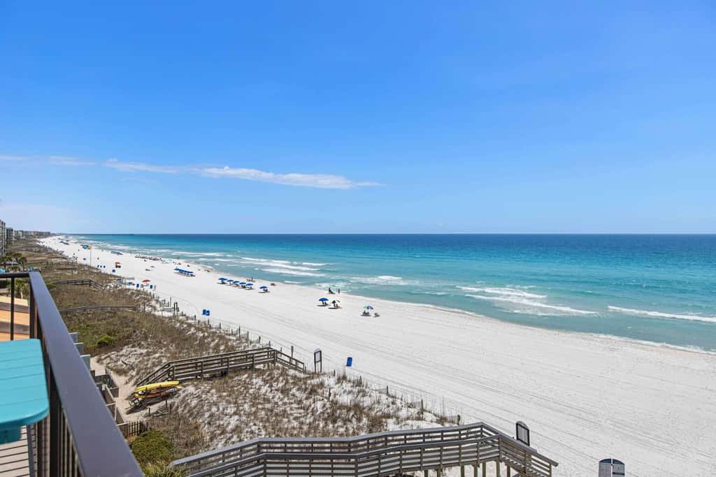 Spacious beachfront condo with full kitchen, shared pool and beach access