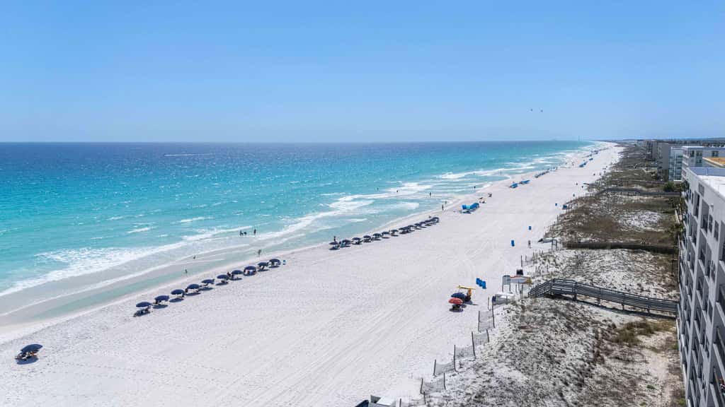 Spacious beachfront condo with full kitchen, shared pool and beach access