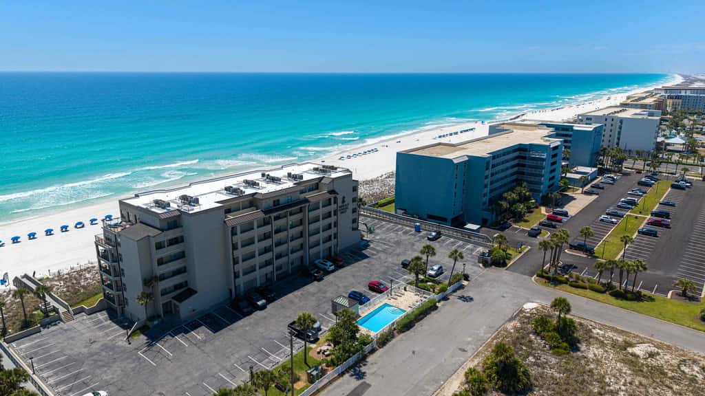 Spacious beachfront condo with full kitchen, shared pool and beach access