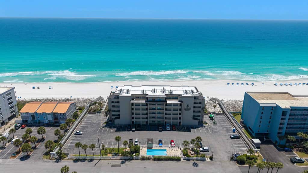 Spacious beachfront condo with full kitchen, shared pool and beach access