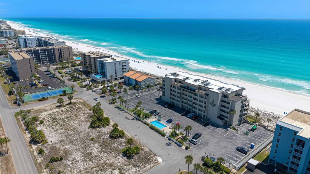 Spacious beachfront condo with full kitchen, shared pool and beach access
