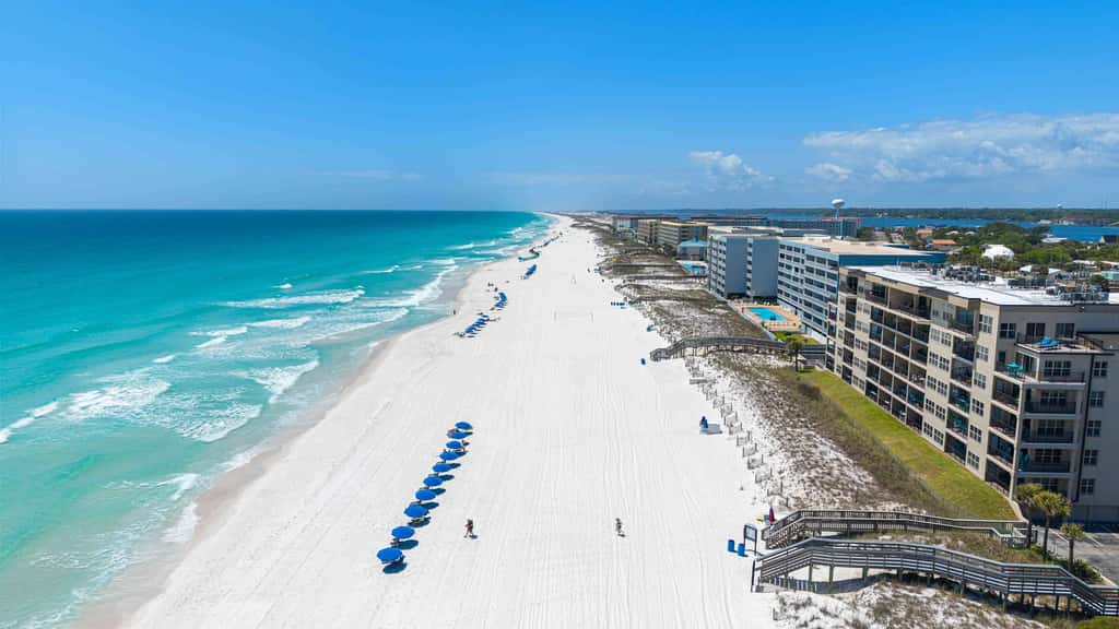 Spacious beachfront condo with full kitchen, shared pool and beach access