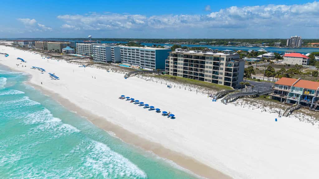 Spacious beachfront condo with full kitchen, shared pool and beach access