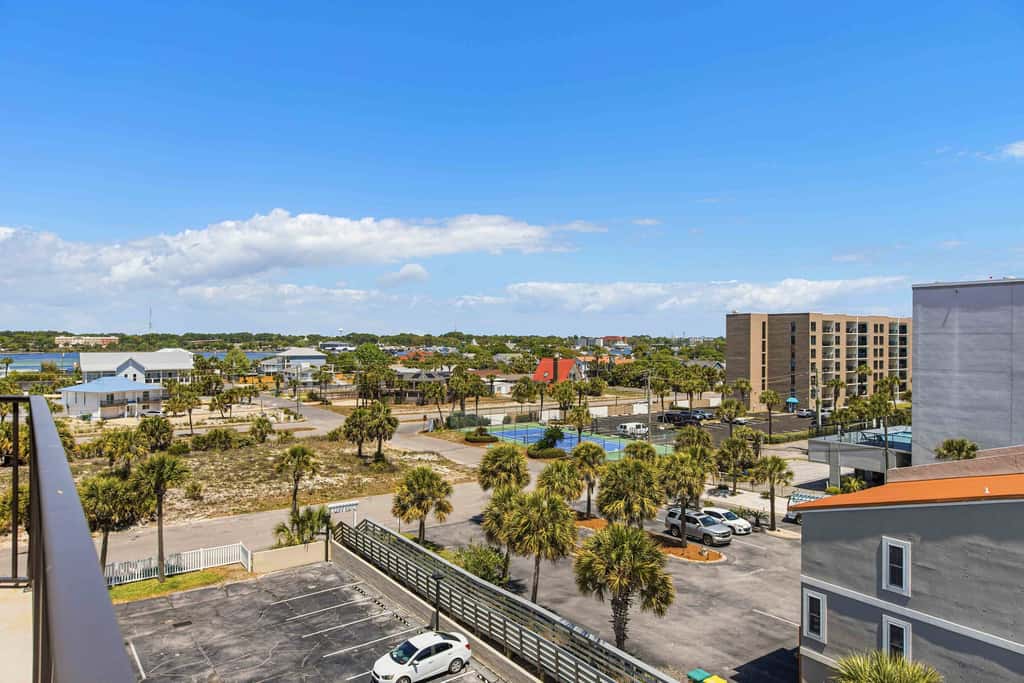 Spacious beachfront condo with full kitchen, shared pool and beach access
