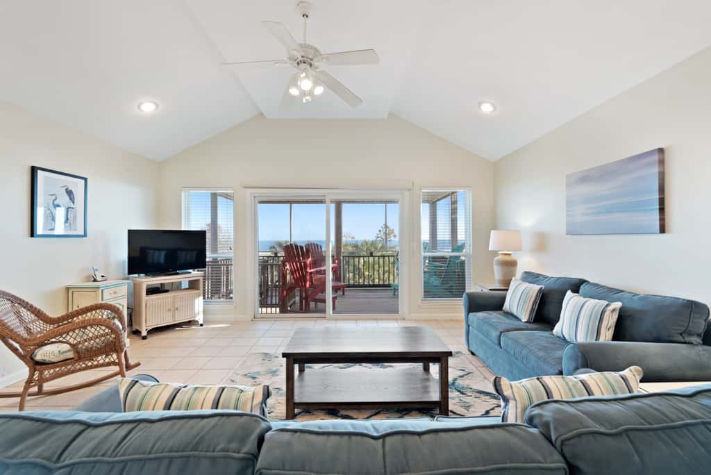 Beachfront home with screened porch with boardwalk access to pool