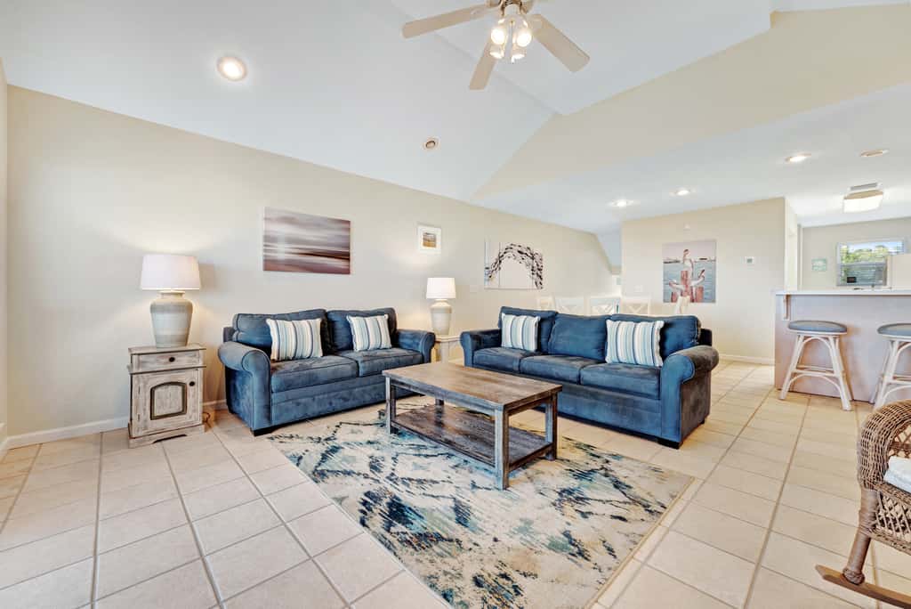 Beachfront home with screened porch with boardwalk access to pool
