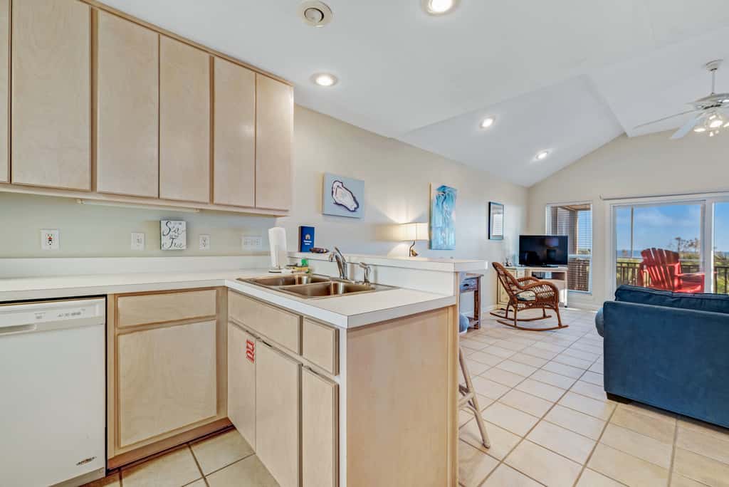 Beachfront home with screened porch with boardwalk access to pool