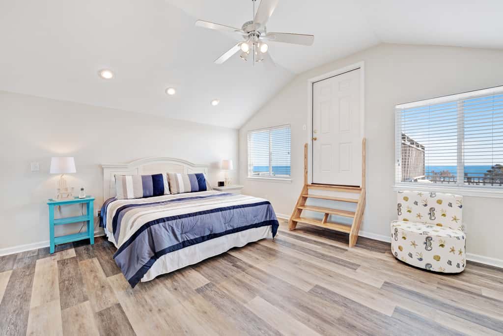 Beachfront home with screened porch with boardwalk access to pool
