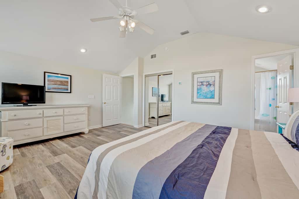 Beachfront home with screened porch with boardwalk access to pool