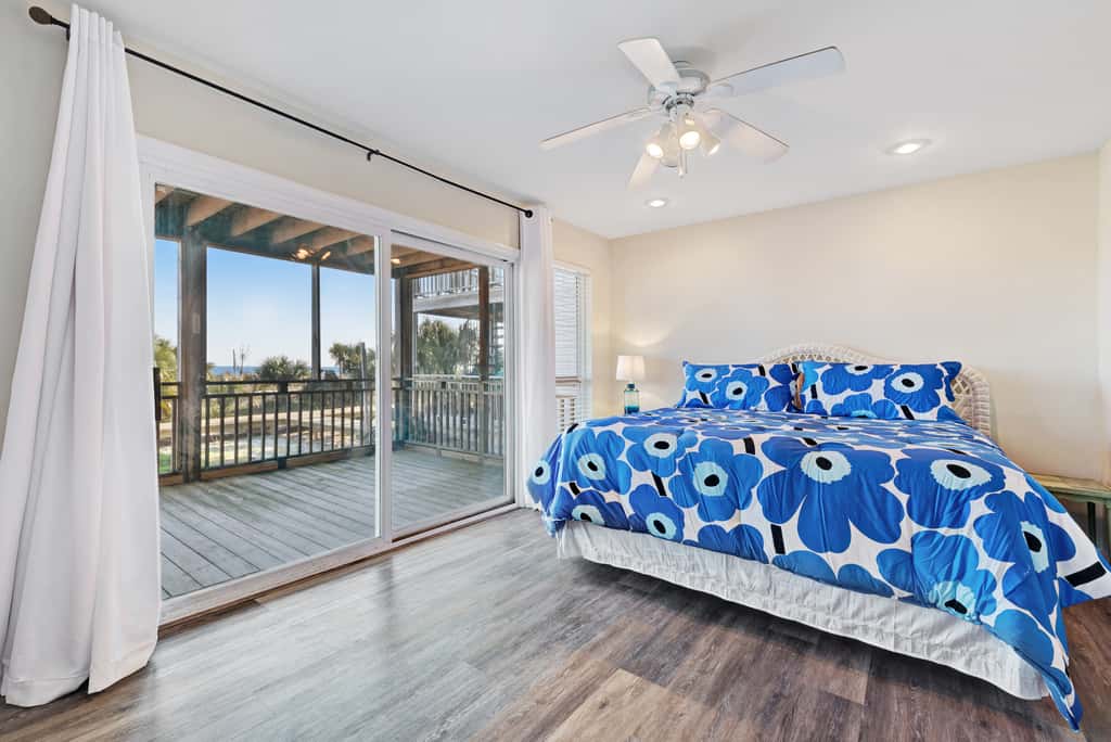 Beachfront home with screened porch with boardwalk access to pool