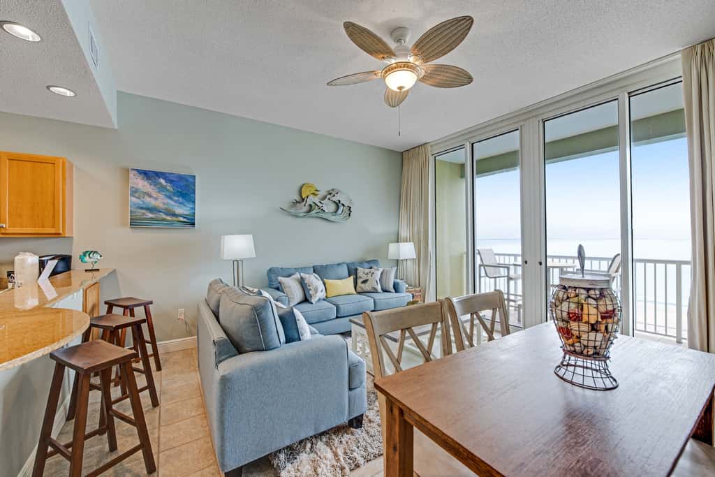 Stunning top-floor condo with balcony, pool, & beach access - great location