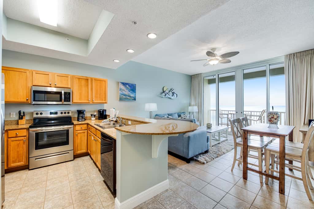 Stunning top-floor condo with balcony, pool, & beach access - great location
