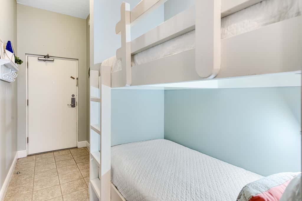 Stunning top-floor condo with balcony, pool, & beach access - great location
