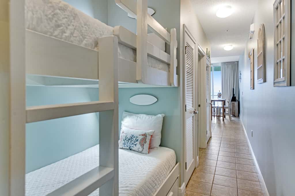 Stunning top-floor condo with balcony, pool, & beach access - great location