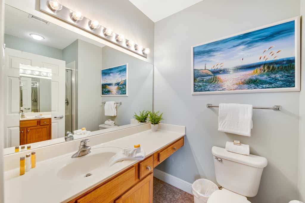 Stunning top-floor condo with balcony, pool, & beach access - great location
