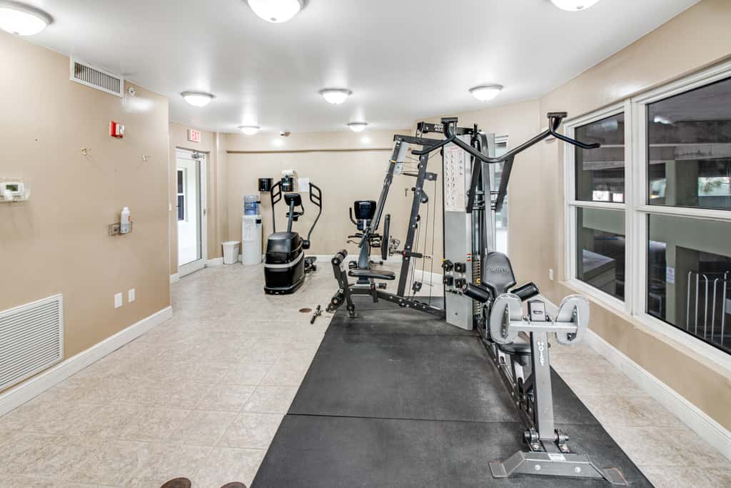 Stunning top-floor condo with balcony, pool, & beach access - great location