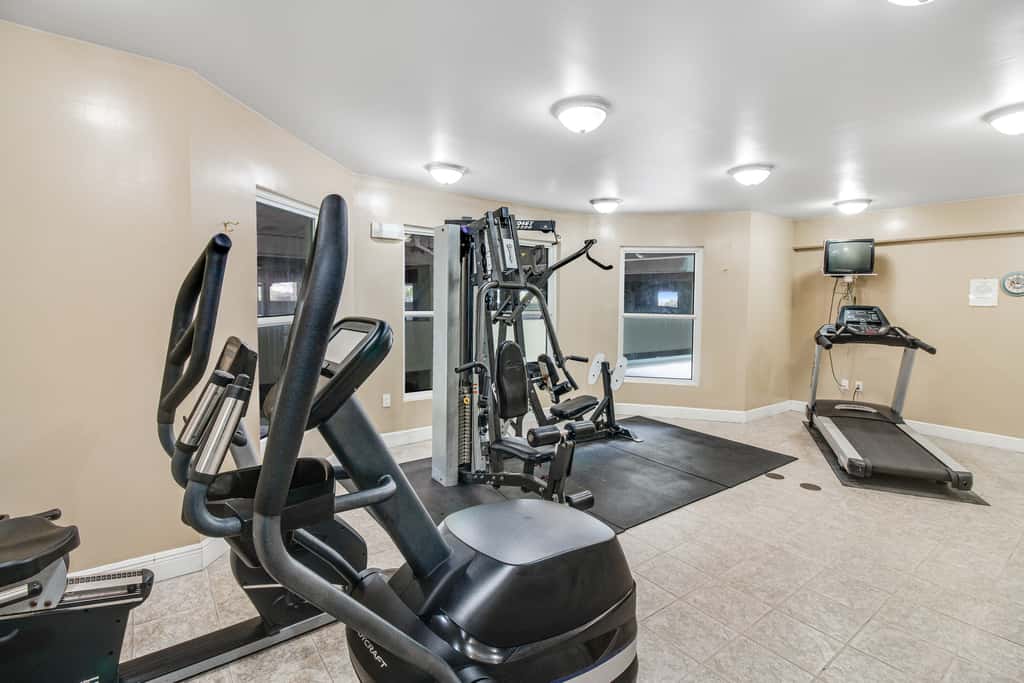 Stunning top-floor condo with balcony, pool, & beach access - great location