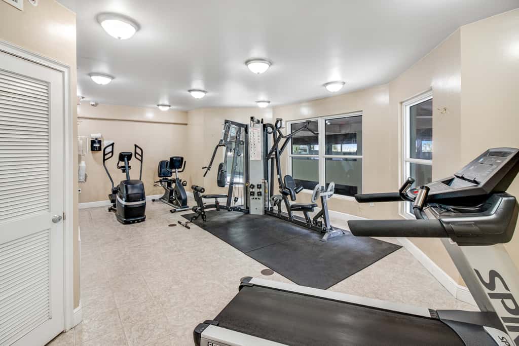 Stunning top-floor condo with balcony, pool, & beach access - great location