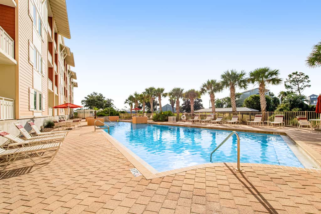 Waterfront Home Close to Beach with Shared Pool, Hot Tub, Free WiFi, & Central AC